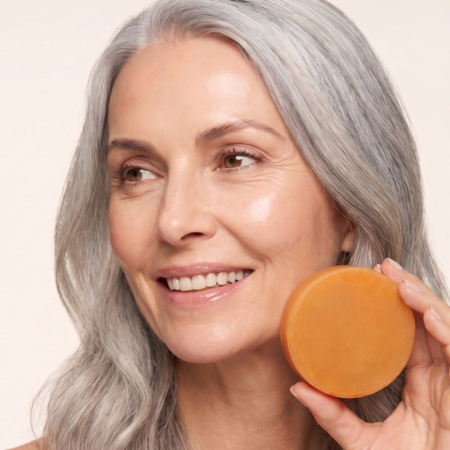Woman holding the saffron cleansing bar