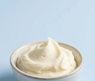 Whipped grass-fed tallow in a small bowl